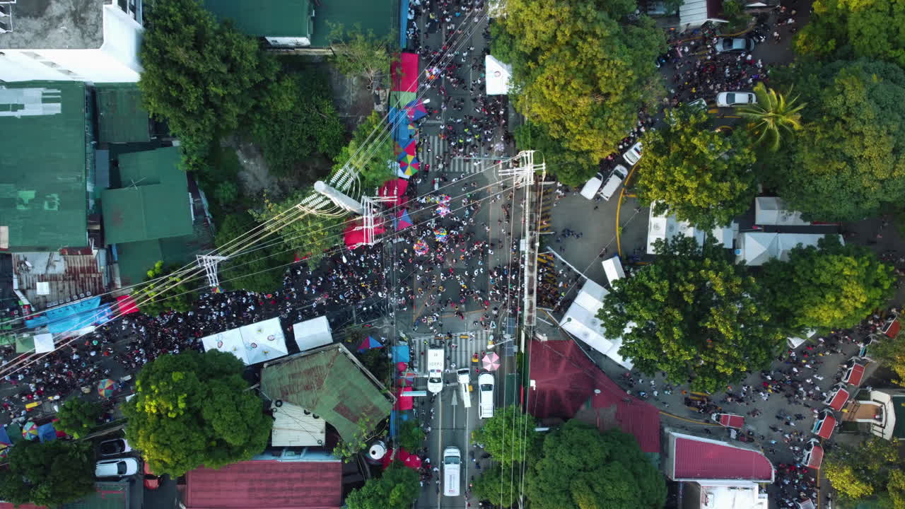 Top down drone shot above the crowded gate to the south cemetery, in Manila