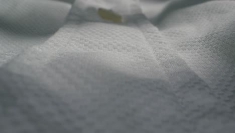 closeup of an expertly tailored suit that beautifully showcases its sophisticated buttons and fine fabric texture