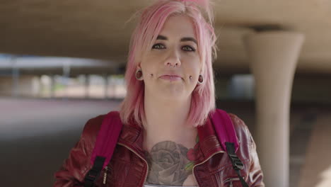 portrait of eccentric young woman looking alternative punk wearing red jacket