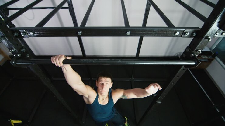 Athlete does exercises in the gym 1