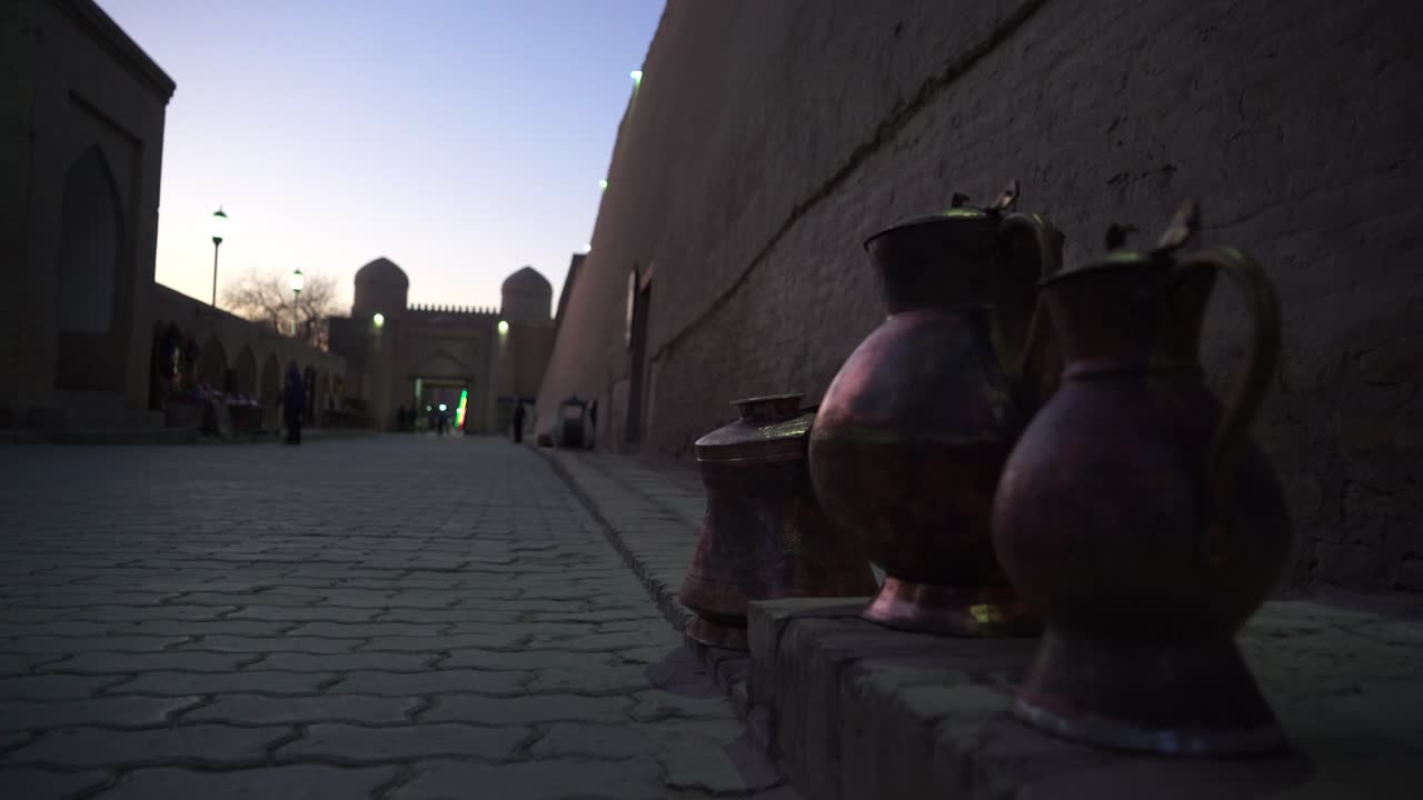 Khiva city center eastern jugs on the street