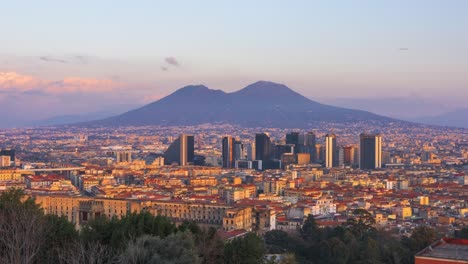 naples, italy with the financial district skyline under mt. vesuvius