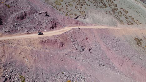 Camping-Car-Driving-On-Andes-Mountain-Pass-To-Termas-Valle-de-Colina,-Popular-Hot-spring-Valley-In-CHile