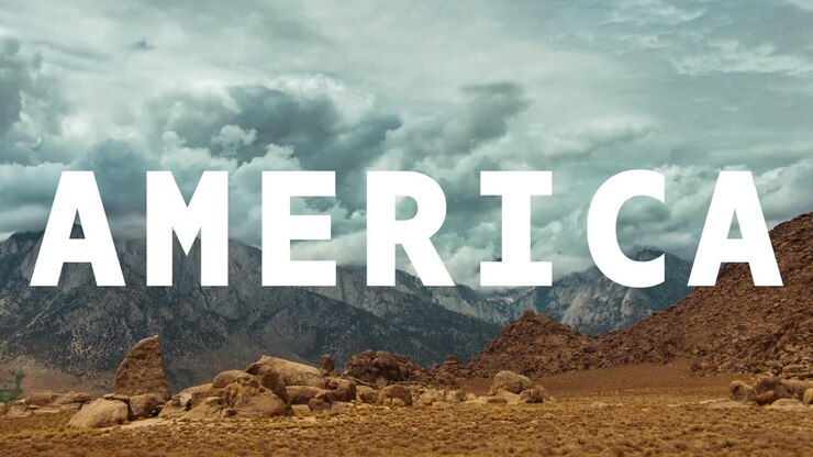 berge und wüstenlandschaft im amerikanischen nationalpark überlagert mit animierten grafiken, die amerika ausdrücken