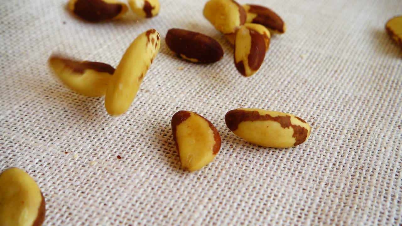 Brazil nuts. Shooting while falling on a sack. Slow motion
