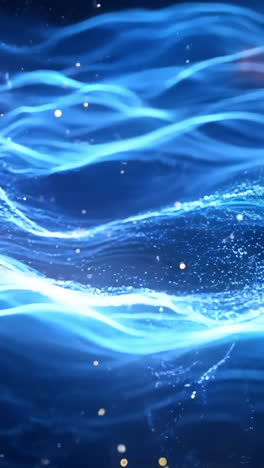 a blue wave with orange and white specks. the blue wave is very large and the orange and white specks are scattered throughout the wave