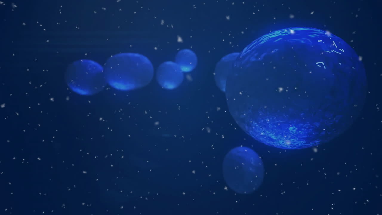 파란색 배경에서 번식하는 파란색 원자의 애니메이션