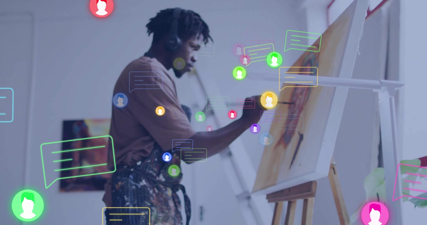 Young Artist Painting on Canvas with Digital Social Media Graphics