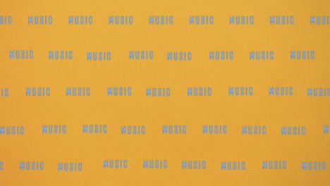 animación de textos musicales que se mueven sobre un fondo amarillo