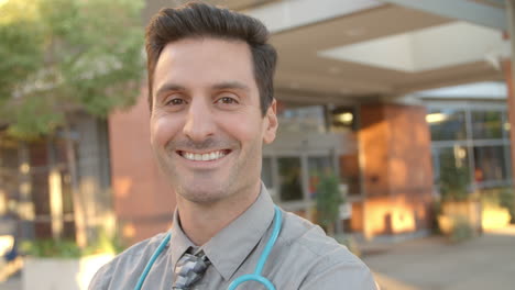 portrait of doctor standing outside hospital shot on r3d