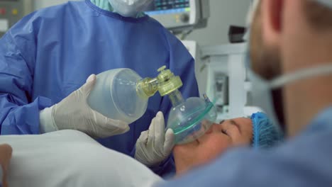 close-up of caucasian female surgeon operating pregnant women in operation theater at hospital