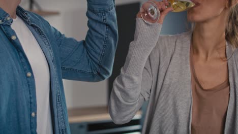 Couple-celebrating-house-ownership-with-a-champagne