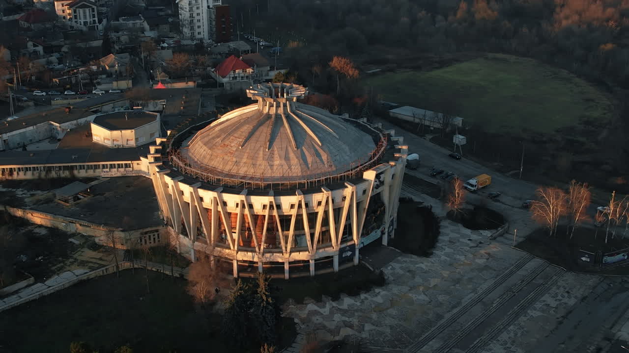 Aerial drone view of the Chisinau at sunset, Moldova. Residential buildings and park