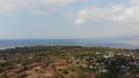 Drone-shot-of-Gili-Air-island,-Indonesia,-on-a-hot,-sunny-day