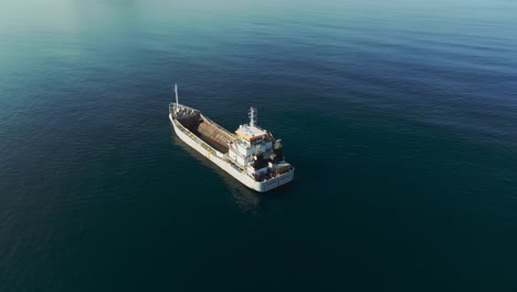 aerial view of empty barge floating in the sea near the manzanillo port, colima, mexico