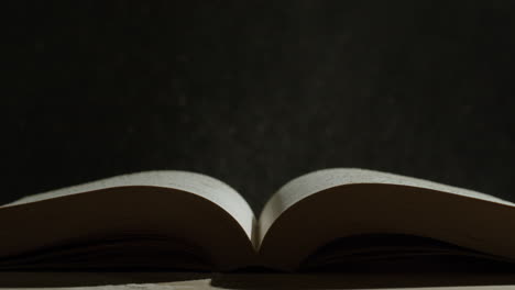 open book with water droplets
