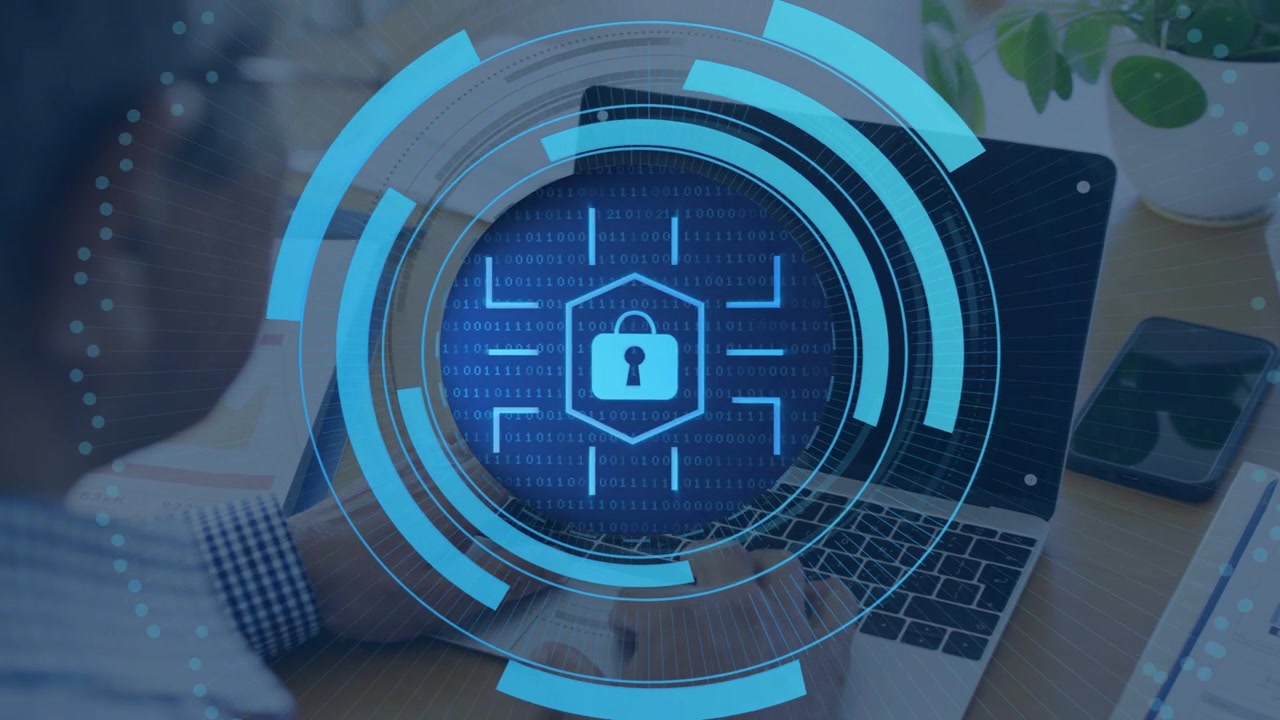 Man typing on laptop, starting security scan with rings forming, covering screen and revealing lock