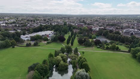 aerial view of horsham park with pond and green trees and grass in west sussex united kindgom