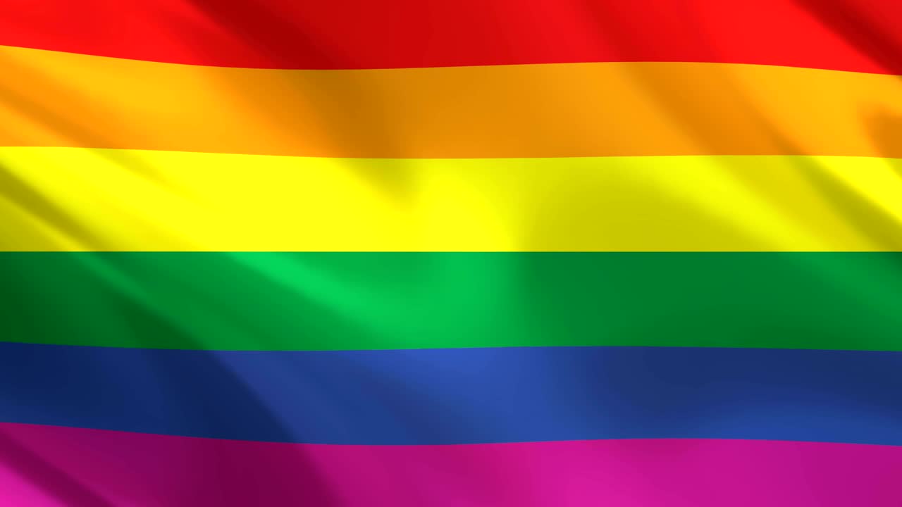 la bandera gay del arco iris agitando