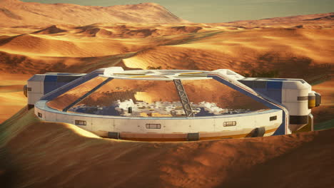 futuristic space station in a desert landscape