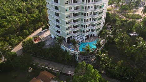 hotel in a tropical location with swimming pool, travel destination in thailand