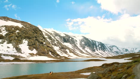 scenic mountain lake with snow