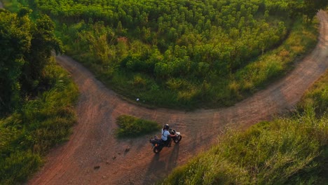 motorcycle adventure through green fields