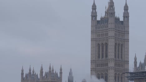 palace of westminister, london, cinematic tilt up establisher on a cloudy day