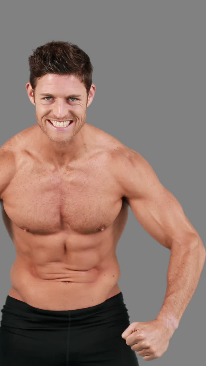 Muscular man flexing his muscles