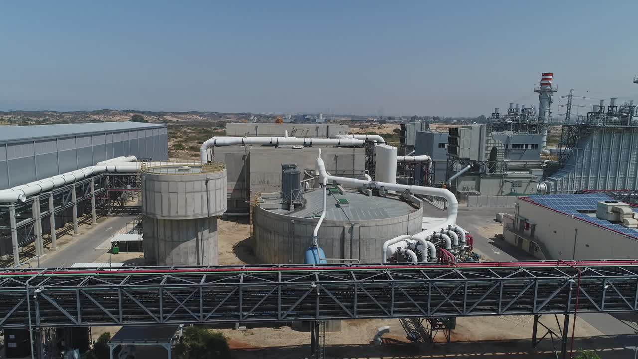 Aerial footage of a large scale waste water recycling and treatment facility