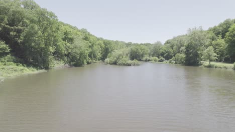 a drone shot of a beautiful natural scenery of river and tropical green forest