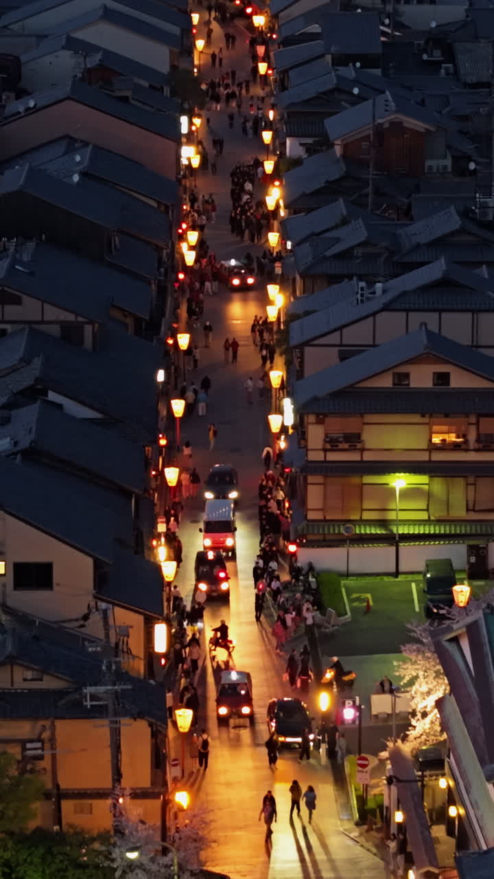 Aerial drone view of the Hanamikoji Street in Kyoto, Japan in the evening