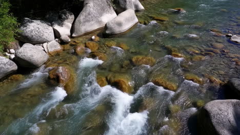 clear mountain river with rapids and rocks