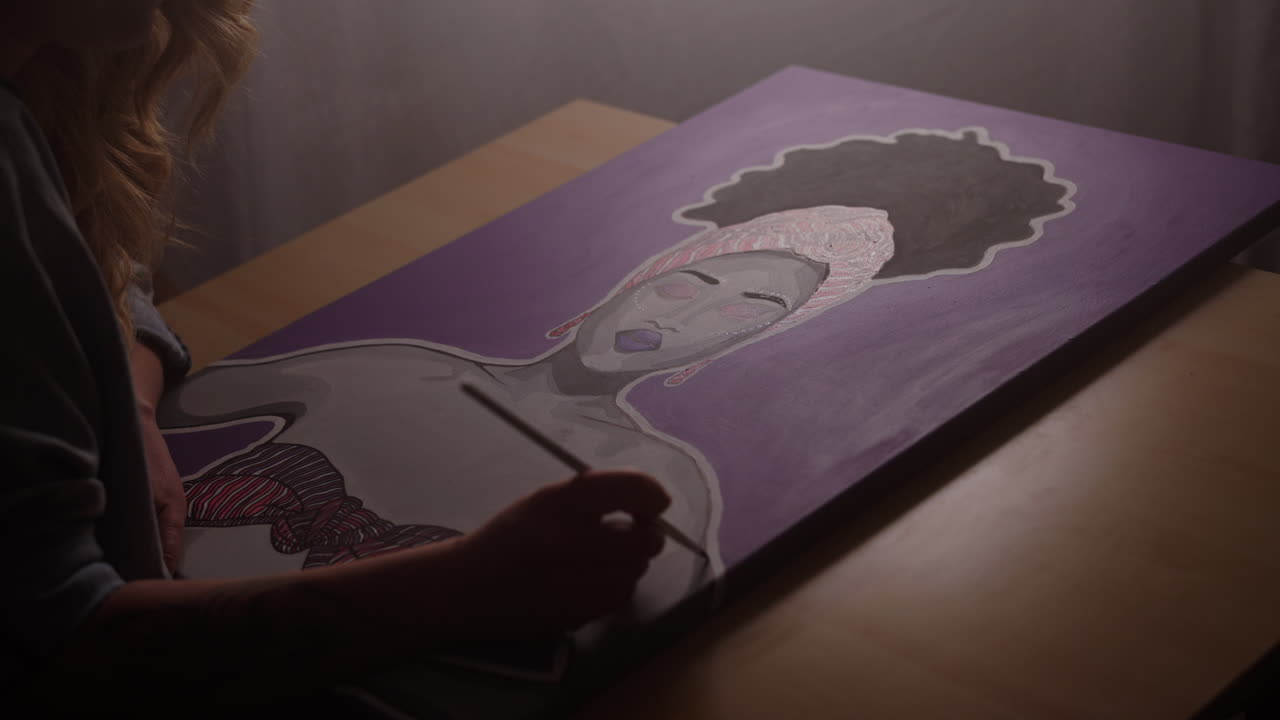 Woman Painting a Portrait of an African American Woman