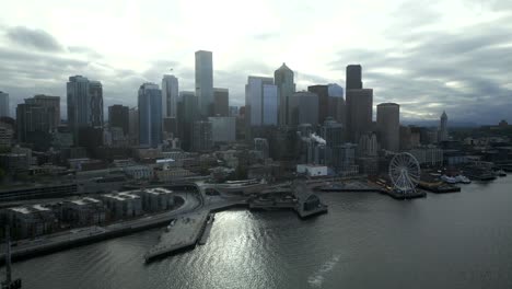 aerial view over seattle waterfront in seattle, wa, usa - drone shot