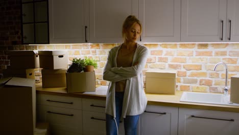 zoom out video of tired woman standing during moving house