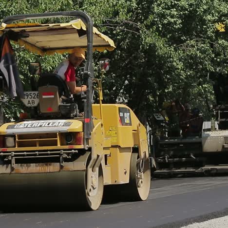 laying asphalt on the street