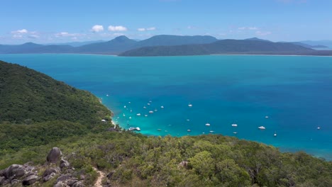 Fitzroy-Island-summit-lookout-aerial-with-ocean,-boats-and-landscape,-Queensland,-Australia