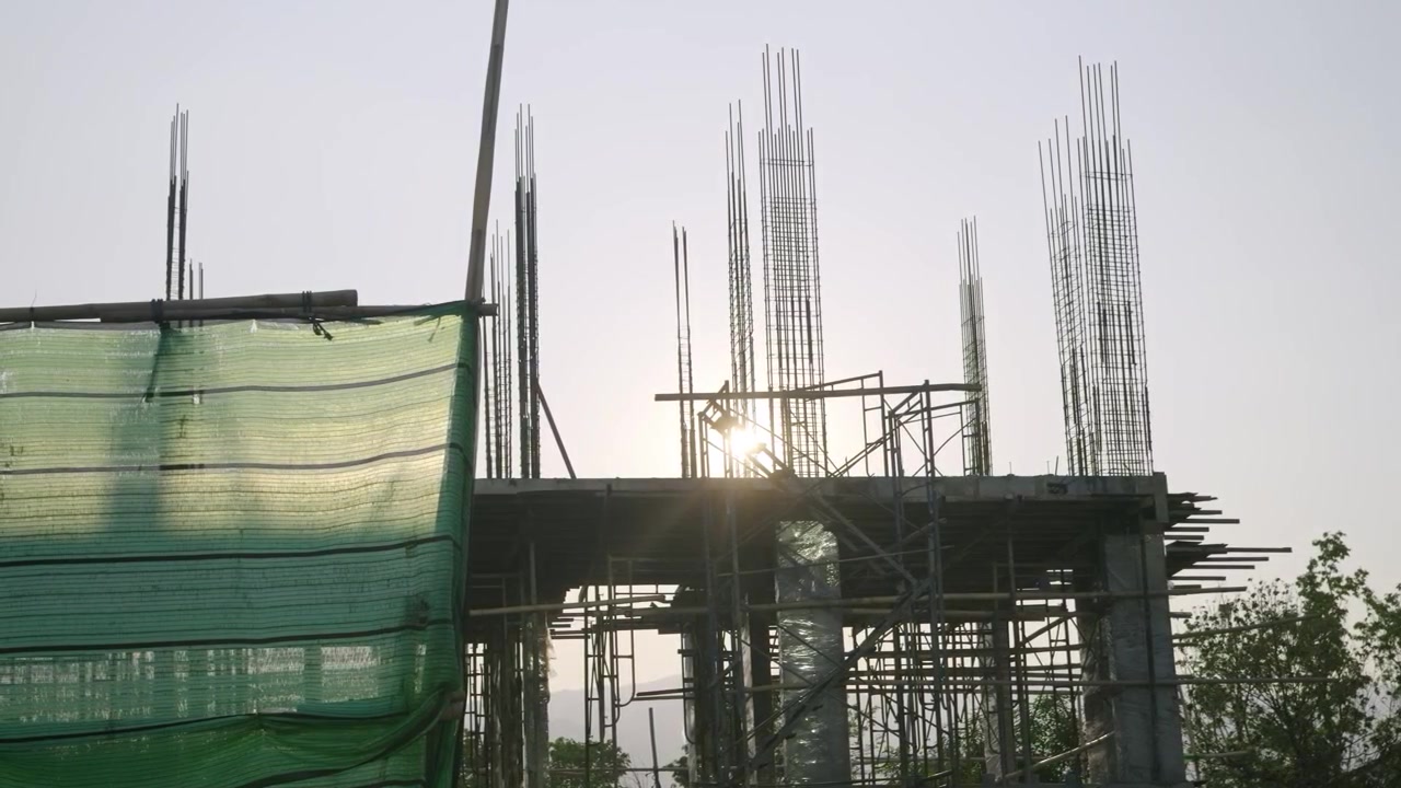 Silhouette of unfinished construction site in Asia