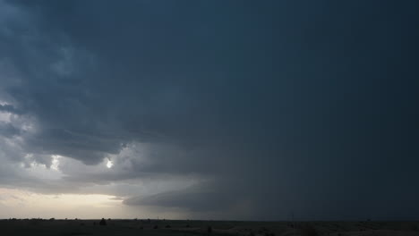 dramatic storm clouds over rural landscape
