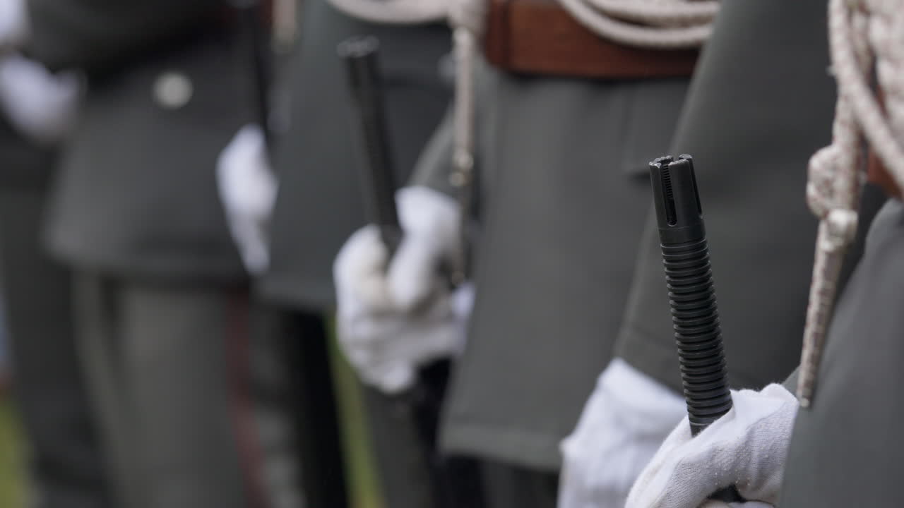 Soldiers in Formal Uniforms with Batons