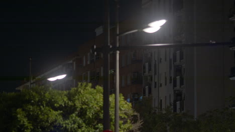 night city street scene with buildings and streetlights