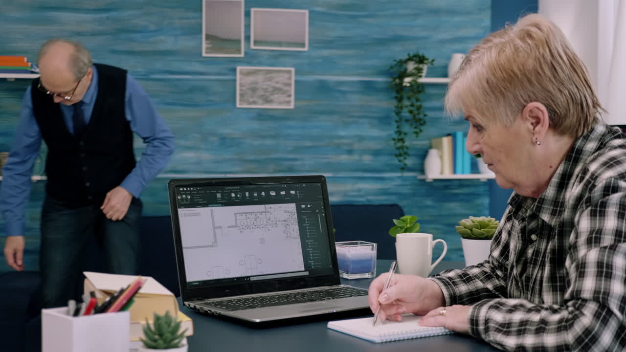 Middle aged woman engineer working with architectural plans