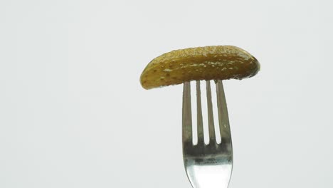 a pickle on a fork