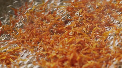 closeup of edible flowers cooking