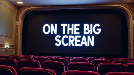 empty cinema with 'on the big screan' on the screen