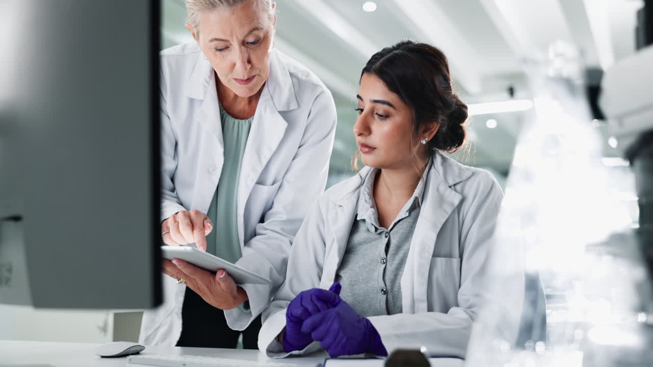Scientists collaborating in a lab