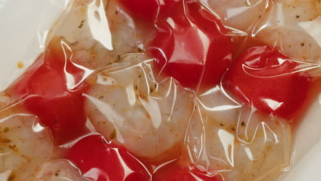 vacuum-sealed shrimp and tomatoes