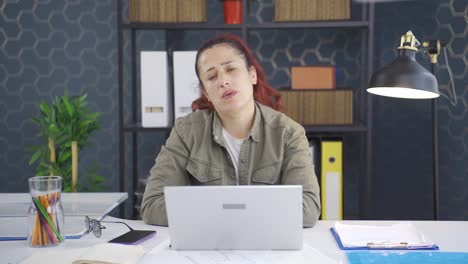 Business-woman-looking-at-camera-unhappy-and-depressed.