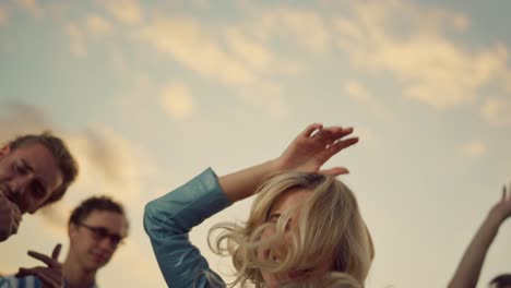 portrait of happy woman swirling on dance floor outdoors